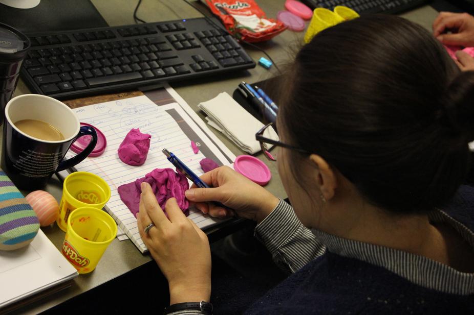 KMA students interacting using molding clay