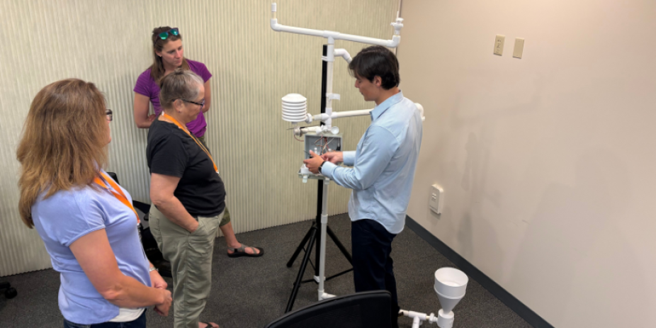 COMET Engineer, Will Nicewonger, shows data workshop participants how to access the 3D-PAWS data logger. 