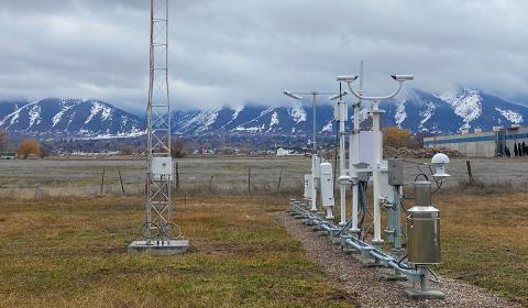 A photo showing a field with ASOS and AWOS